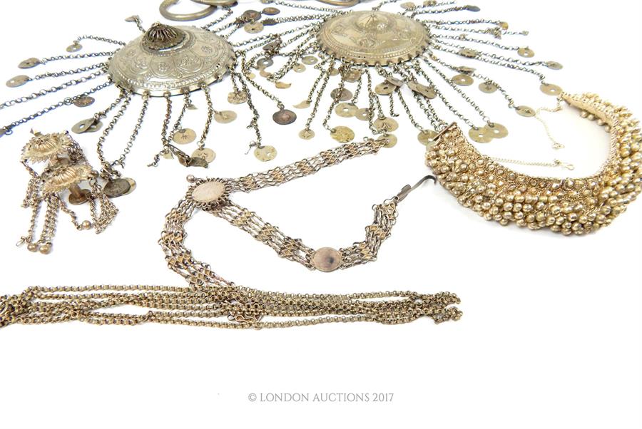 A collection of Indo-Persian white metal jewellery, some set with Indian Rupees. - Image 3 of 3