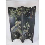 A Chinese black lacquered four fold screen