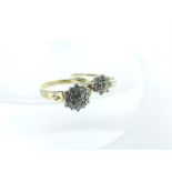 Two 9 ct yellow gold, diamond rings