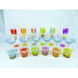 A collection of hand painted drinking glasses