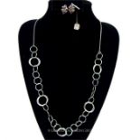 A collection of silver jewellery including a hooped necklace
