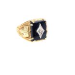 A Gentleman's, 1940's, 10 ct gold, onyx and diamond ring