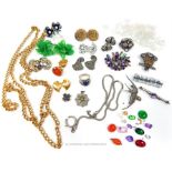 A collection of costume jewellery to include sterling silver items and loose stones