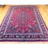 A signed Northeast Persian Mashad carpet