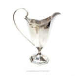 A late Victorian sterling silver helmet form cream jug
