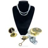 A collection of mid 20th century dressing table items and a necklace