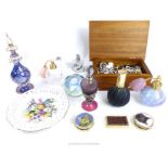 A collection of perfume bottles, costume jewellery and items
