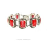 A fine, sterling silver, Art Deco-style bracelet inset with marcasite and coral plaques