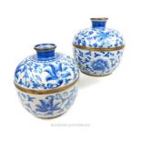 A pair of large Chinese blue and white jars and covers