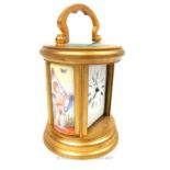 ELLIOTT AND SONS,AN EARLY 20th CENTURY GILT BRASS AND ENAMEL CYLINDRICAL CARRIAGE CLOCK, having