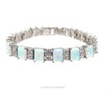 A substantial, sterling silver, white crystal and opalite bracelet