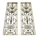 A matching pair of long, cast iron, Art Nouveau, grilles/panels