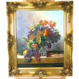 A large, contemporary, oil painting of a still life of grapes in ornate gilt frame
