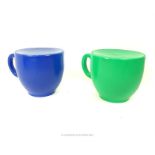 Two children's plastic ''Holly Palmon'' tea cup garden seats in blue and green; 40 cm high;