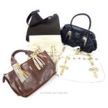 A collection of five designer ladies handbags