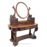 A late 19th century walnut Duchess dressing table