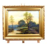 T. Wood, framed oil painting of a country scene with trees, sheep and a river