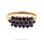 An elegant, 9 ct yellow gold and sapphire ring