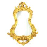 A fine, early 20th century, carved gilt, wooden mirror