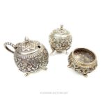 A set of three Indian silver cruets