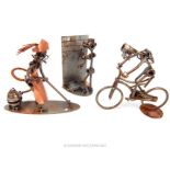 Three figures made from scrap metal