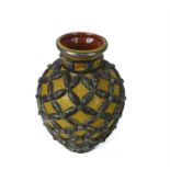 A large, Eastern vase with a yellow crackle-glazed body and white metal overlay
