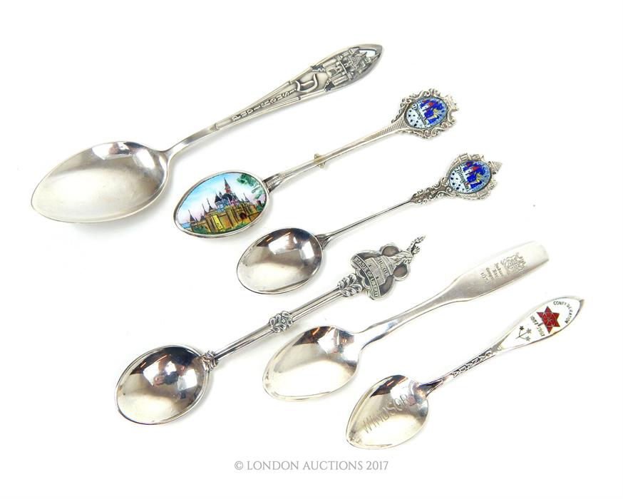 A collection of sterling silver and silver plated souvenir spoons for the USA and Canada