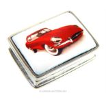 A silver box, having an enamelled Jaguar E-Type to the lid