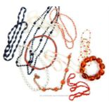 A collection of vintage coral, pearl and jet jewellery