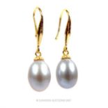 A boxed pair of 14 ct yellow gold and natural Akoya grey pearl drop earrings