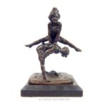 A bronze figural group of two acrobats