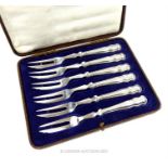 A cased set of six, elegant, sterling silver dessert forks