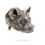 A silver novelty snuff box in the form of a dog's head
