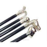 A collection of five contemporary novelty chromed and ebonised walking sticks