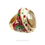 A silver gilt and enamelled ring