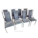 A set of eight stylish, retro dinning chairs upholstered in grey/blue fabric