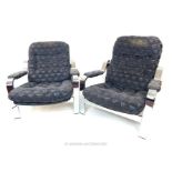 A pair of vintage reclining chrome open armchairs