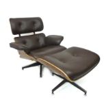 A modern reclining chair with leather upholstery and bent wood construction