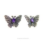 An elegant pair of sterling silver, amethyst and marcasite drop earrings