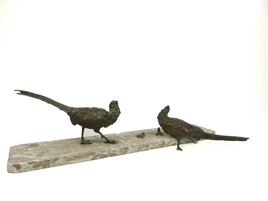 A pair of Art Deco bronze sculptures of pheasants