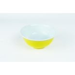 A Chinese, porcelain bowl with a bright yellow outer glaze