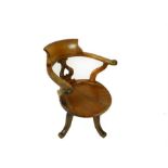 A late Victorian oak office chair