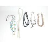 An assortment of beaded costume jewellery necklaces