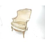 An elegant, early 20th century, carved, French armchair