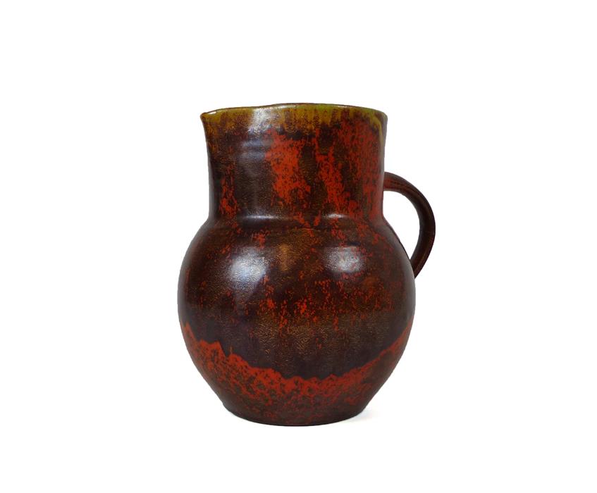 A large, rare, early 20th century, hand-thrown, studio pottery jug with flambe-style glaze