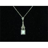 A silver marcasite pendant necklace with a square opalite panel.