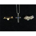 A silver cross and other jewellery