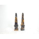 A pair of marble obelisks