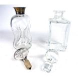 Two glass decanters, including one with a HM silver collar; each approximately 26.5cm high.