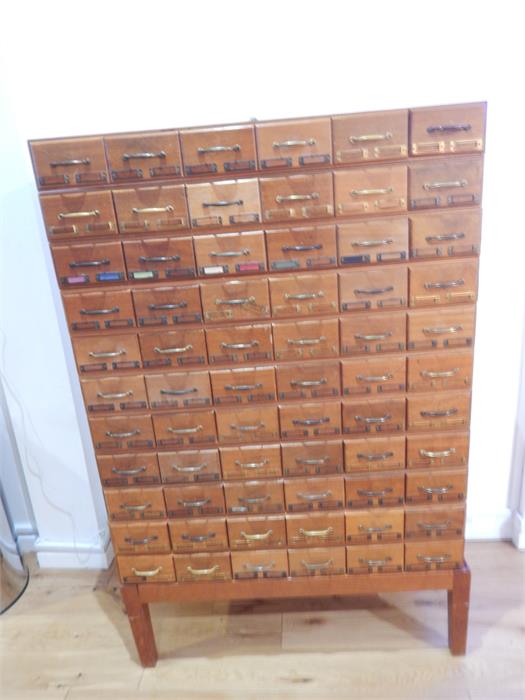 An oak stacking office filing cabinet